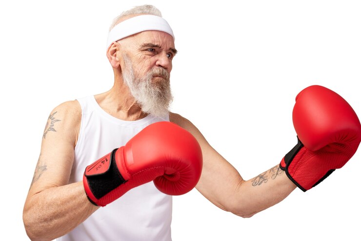 PSD gratuito ritratto di uomo anziano con guantoni da boxe