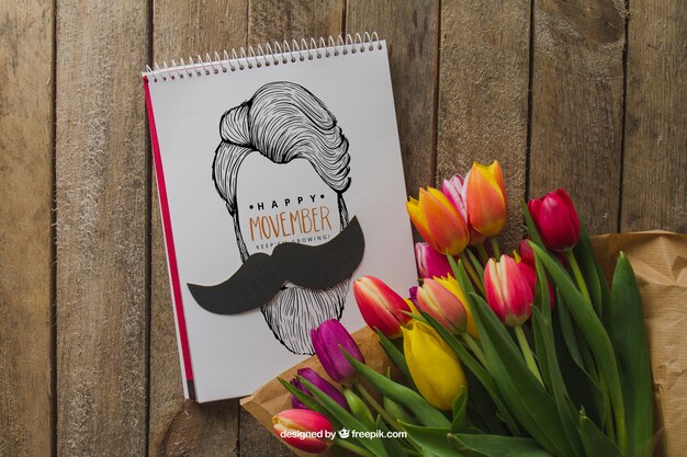 Rosas y libreta para el día del padre