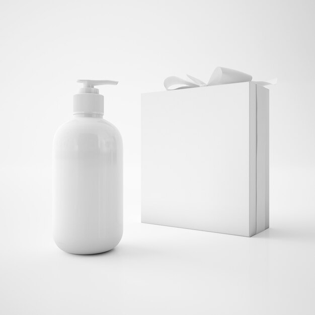 Scatola bianca con nastro e contenitore del sapone