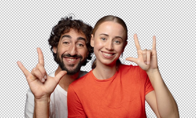 sentirse feliz divertido confiado positivo y rebelde haciendo rock o heavy metal señal con la mano