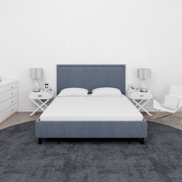 Slaapkamer met een tweepersoonsbed en witte meubels