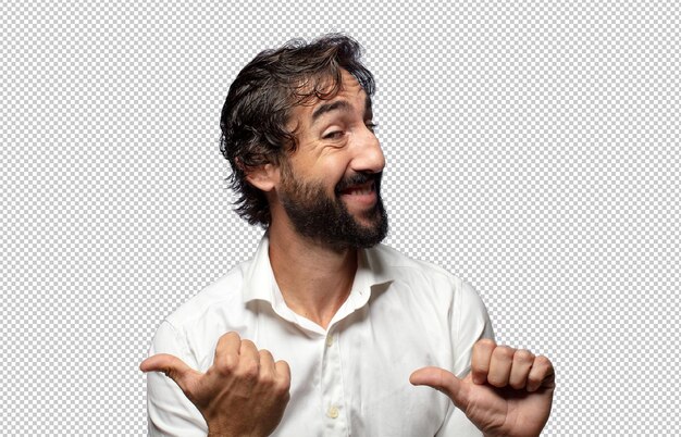 sonriendo alegremente y casualmente señalando para copiar el espacio en el lado sintiéndose feliz y satisfecho