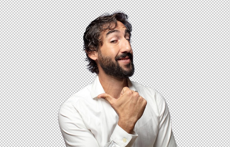 PSD gratuito sonriendo alegremente y casualmente señalando para copiar el espacio en el lado sintiéndose feliz y satisfecho