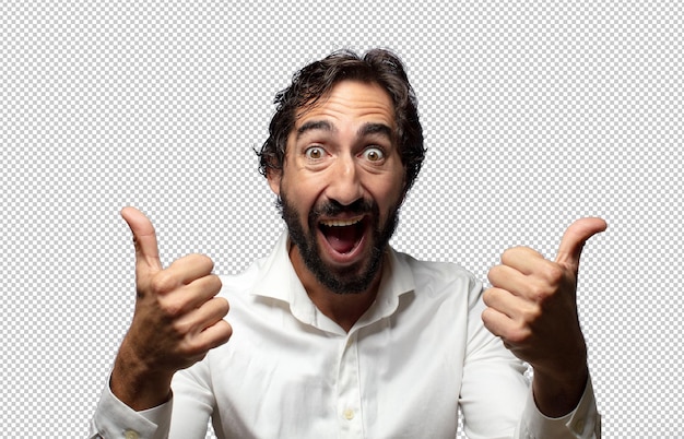 sonriendo alegremente y pareciendo feliz sintiéndose despreocupado y positivo con ambos pulgares hacia arriba