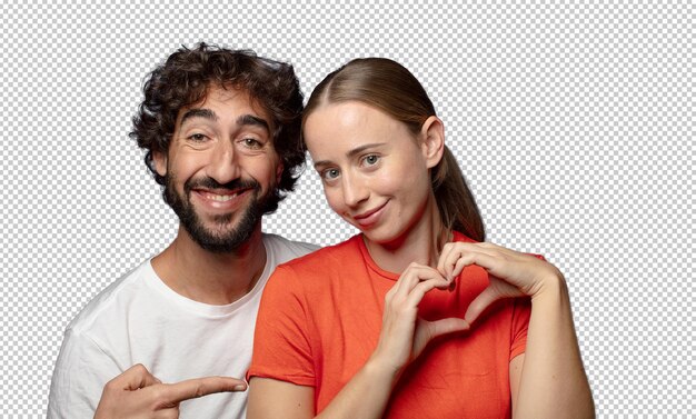 sorridendo e sentendosi felice carino romantico e innamorato facendo forma di cuore con entrambe le mani