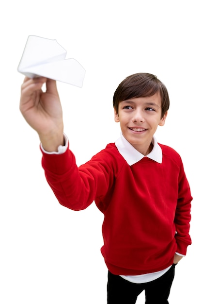Gratis PSD studioportret van jonge jongen met papieren vliegtuigje