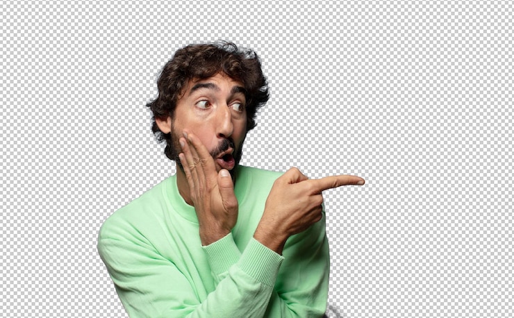 Gratis PSD verrast met een geschokte uitdrukking en wijst naar de zijkant