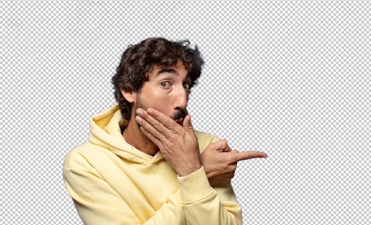Gratis PSD verrast met een geschokte uitdrukking en wijst naar de zijkant