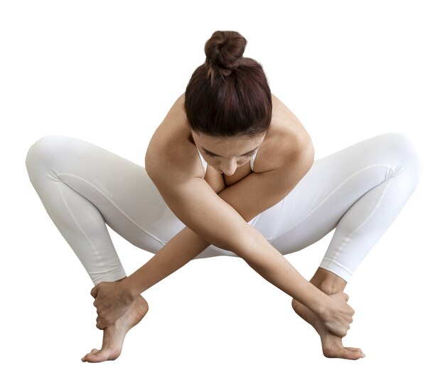 Vista de la mujer en posición de yoga