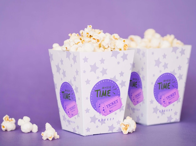 Vooraanzicht van bioscoop popcorn in cups Gratis Psd