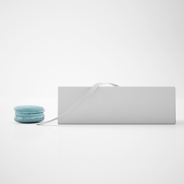 Witte doos met lint en blauwe macaron