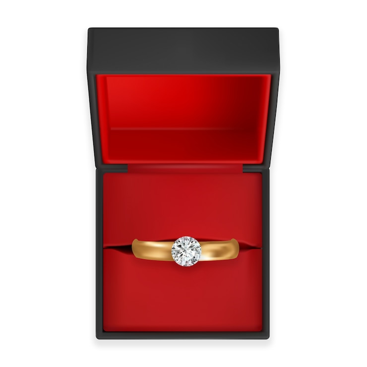 PSD gratuit une bague de mariage réaliste dans une boîte.