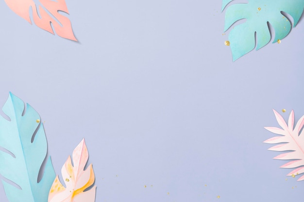 Bordure de feuille de monstera pastel psd dans un style artisanal en papier