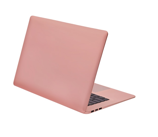 En gros plan sur l'ordinateur portable rose isolé