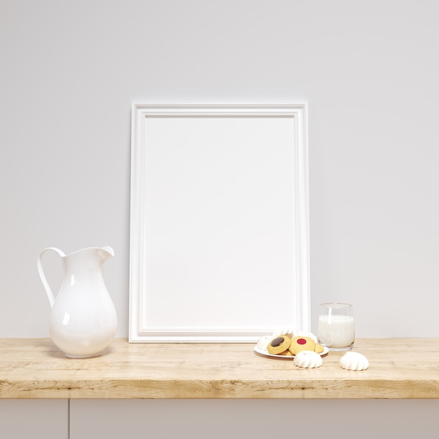 Maquette de cadre blanc sur un comptoir de cuisine avec de délicieux biscuits