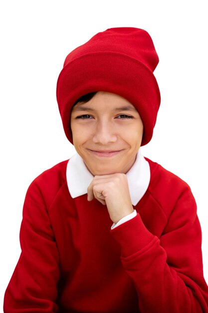 Portrait en studio de jeune fille avec bonnet rouge