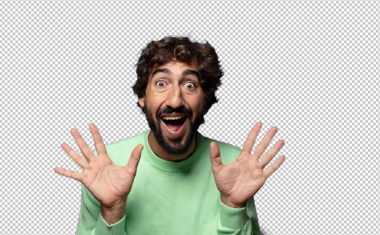PSD gratuit regardant heureux et excité choqué par une surprise inattendue avec les deux mains ouvertes à côté du visage