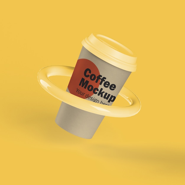 PSD gratuit tasse à café jetable dans un anneau
