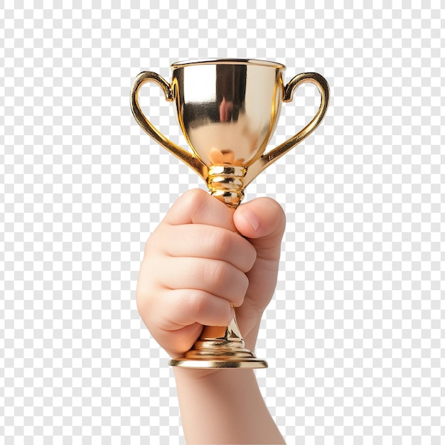 Un trophée d'or triomphal d'un enfant dans de petites mains
