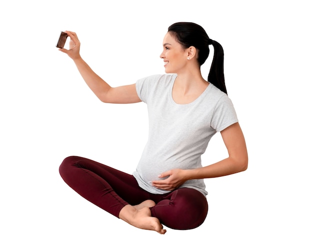 PSD gratuit vue d'une femme enceinte faisant du sport