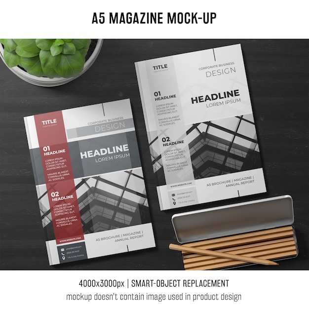 A5 revista mockup com planta e lápis