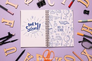 Back to school maquete com caderno e letras