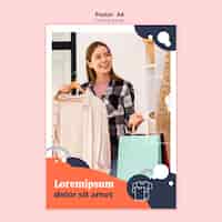 PSD grátis cartaz de loja de roupas com mulher segurando sacos de papel