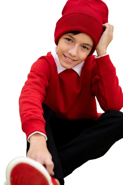 Retrato de estúdio de jovem com gorro vermelho