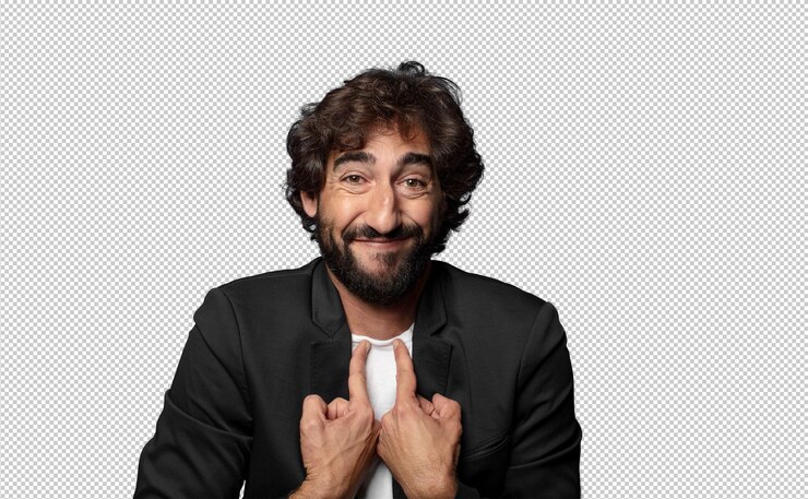PSD grátis sentindo-se feliz, surpreso e orgulhoso, apontando para si mesmo com um olhar emocionado e espantado.