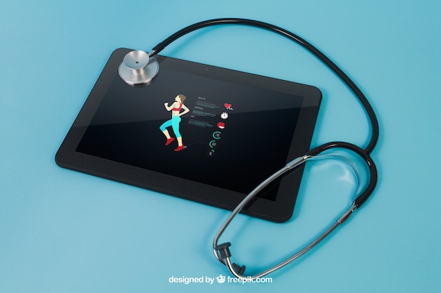 Tablet com app de esportes e estetoscópio