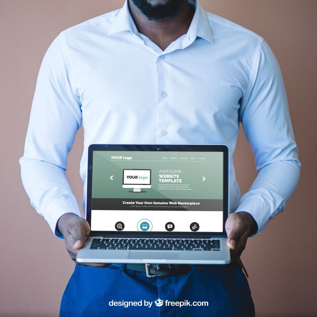 Businessman presenting laptop