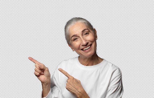 smiling cheerfully and pointing to copy space on palm on the side showing or advertising an object