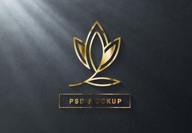 PSD 3d glänzendes goldenes logozeichen auf dunkler wand