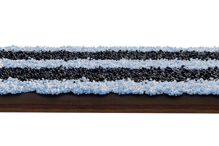 PSD 3d-rendering von quadratischem boden-landgeologie-querschnitt mit steingarvel pebbles und cobbles stone