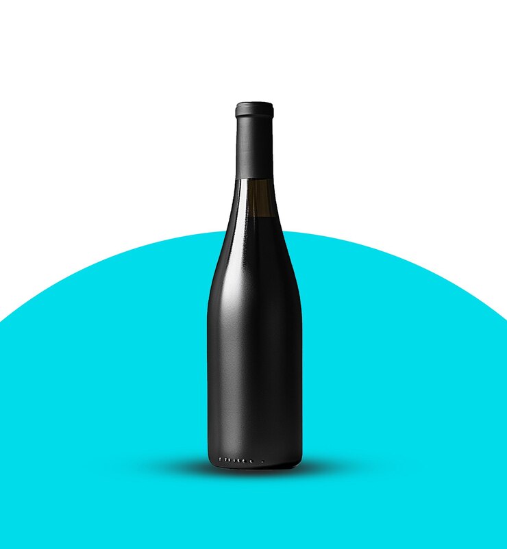 PSD a bottle of wine is on a blue table