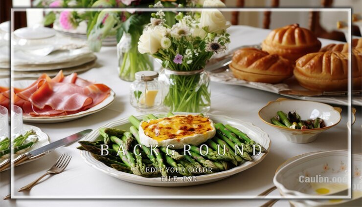 PSD a gourmet meal with baked brie and asparagus on a white tablecloth