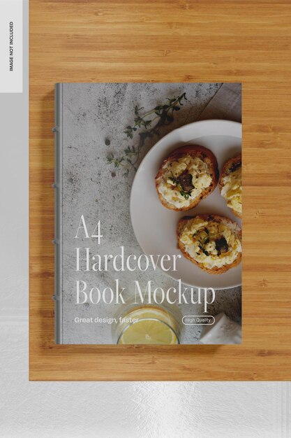 A4-hardcover-buch auf dem tisch mockup 02