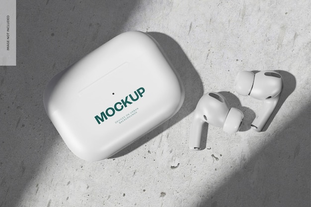 AirPods com estojo em maquete de concreto, vista superior