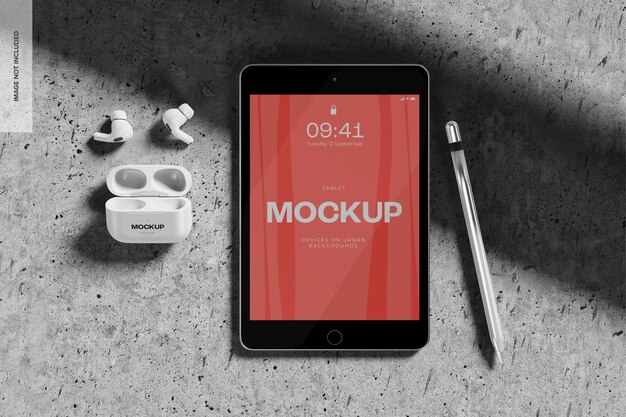 AirPods con iPad Mini su sfondo urbano Mockup, vista dall'alto