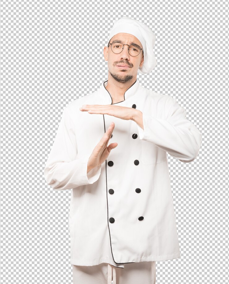 PSD amable joven chef haciendo un gesto de tiempo de espera con las manos