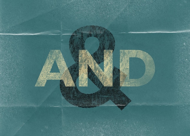 Ampersand and the word AND on teal folded paper