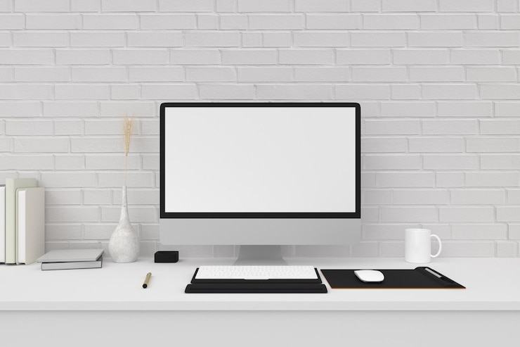 PSD area di lavoro con computer desktop forniture per ufficio libri in ufficio e dispositivi per computer mockup forniture e decorazioni sul concetto di lavoro scrivania tavolo bianco