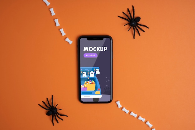 PSD arreglo de halloween con pantalla de teléfono inteligente de maqueta