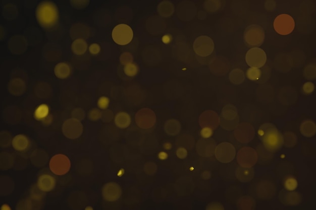 Astratto sfondo sfocato di particelle d'oro per il nuovo anno