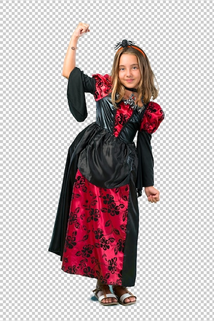 Bambino biondo vestito da vampiro per le feste di Halloween che celebrano una vittoria
