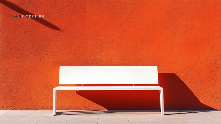 PSD un banco blanco moderno contra una pared naranja vibrante que arroja sombras