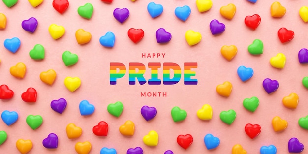 Bandiera dell'orgoglio con cuori color arcobaleno su sfondo rosa e spazio per la copia per il mese dell'orgoglio LGBTQIA