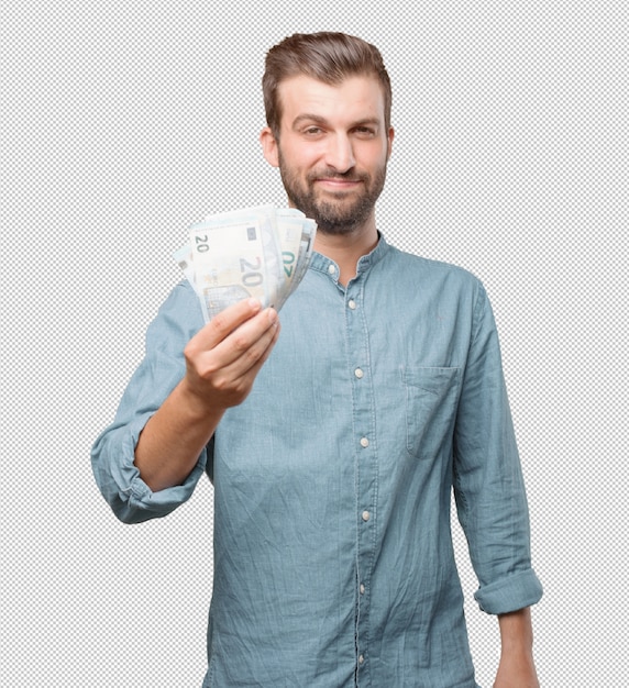 Beau jeune homme avec de l&#39;argent en main