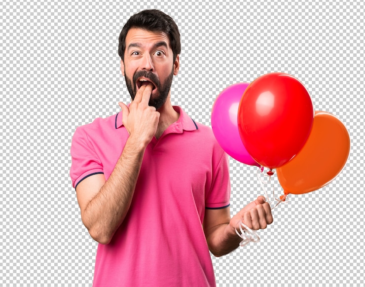 PSD beau jeune homme tenant des ballons et faire des gestes de vomissement