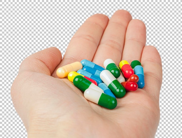Beaucoup de pilules dans la main Concept de médecine isolé sur fond transparent
